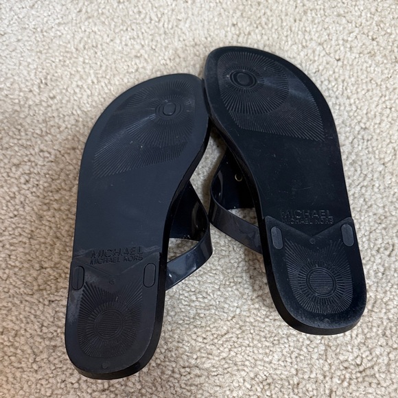Michael Kors Black Flip Flops with Gold Emblem - Picture 3 of 3